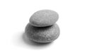 Stacked smooth grey stones. Sea pebble. Balancing pebbles isolated on white background Royalty Free Stock Photo