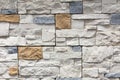 Stacked stone wall, natural stone cladding. Stone wall for background,Slab stone wall texture. Wall background of volcanic Royalty Free Stock Photo