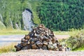 Stacked stones in the form of a pyramid. Altai Republic, Russia