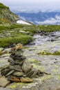 Stacked stones by the Hydnefossen waterfall in Hemsedal, Norway