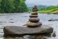 Stacked stones on the river with nature background Royalty Free Stock Photo