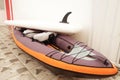 surfboards and inflatable boats