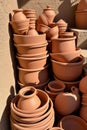 Stacked terracotta pots in sunlight Royalty Free Stock Photo