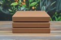 stacked Three Cardboard Boxes Sit On a Wood Table With Nature Background Royalty Free Stock Photo