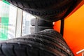 Stacked Tires in a Tire Shop Window Royalty Free Stock Photo