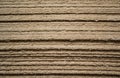 Stacked on top of each other the sheets of hardboard Medium density fiberboard. Close-up of the end sides Royalty Free Stock Photo