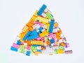 Stacked toys, colorful geometric puzzles for kids, isolated white background Royalty Free Stock Photo