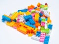 Stacked toys, colorful geometric puzzles for kids, isolated white background Royalty Free Stock Photo