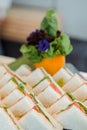 A stacked triangular salmon sandwich. Royalty Free Stock Photo