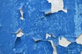 Stacked wall with old blue paint texture. High resolution photo