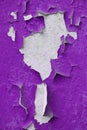 Stacked wall with old purple paint texture. High resolution photo