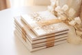 stacked wedding invitations with beige and white tones Royalty Free Stock Photo