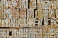 Stacked wooden bars fence on a lumber yard. Building materials Royalty Free Stock Photo