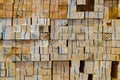 Stacked wooden bars fence on a lumber yard. Building materials Royalty Free Stock Photo