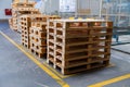 Stacked wooden pallets at a storage Royalty Free Stock Photo