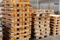 Stacked wooden pallets at a storage Royalty Free Stock Photo