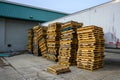 Stacked Wooden Pallets on a Warehouse Loading Dock Royalty Free Stock Photo