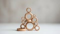 Stacked Wooden Rings: Minimalist Composition on White Background Royalty Free Stock Photo