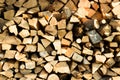 Stacked woodpile of cut and split dried logs Royalty Free Stock Photo