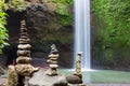 Stacked zen stone at Tibumana Waterfall in Ubud Bali Indonesia Royalty Free Stock Photo