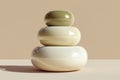 Stacked zen stones with soft beige background. Royalty Free Stock Photo