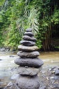 Stacked zen stones at Tegenungan Waterfall at Bali, Indonesia Royalty Free Stock Photo