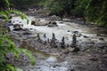 Stacked zen stones at Tegenungan Waterfall at Bali, Indonesia Royalty Free Stock Photo