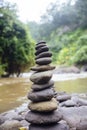 Stacked zen stones at Tegenungan Waterfall at Bali, Indonesia Royalty Free Stock Photo