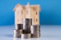 A stacking coins and house model Royalty Free Stock Photo