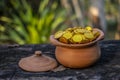 Stacking Gold Coin in jar on wooden with blurred background, Money stack for business planning investment and saving future concep Royalty Free Stock Photo