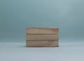 Stacking 3 rectangle empty wooden blocks on table with light turquoise background for own customer text or letters. Idea of