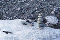 Stacking stones on iceberg