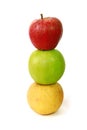 Stacking of three apples of different varieties