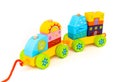 Stacking Train Toddler Toy for little children, isolated on white background. Baby train made of wooden geometric blocks. Colorful Royalty Free Stock Photo