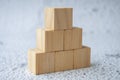 Stacking wooden cubes with customizable space for text. Copy space concept.