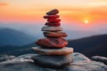 Stacks balanced stones catching sunrise glow, sunrise and sunset wallpaper