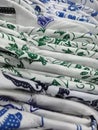 stacks of batik-patterned shirts hang neatly in the shop Royalty Free Stock Photo