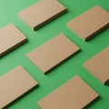 Stacks of blank, brown rectangular cards arranged on a green surface. Each stack Royalty Free Stock Photo