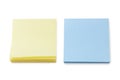 Stacks of blank yellow & blue Post-it notes Royalty Free Stock Photo