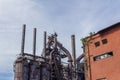 Stacks blast furnaces with rusting exterior, abandoned industrial landscape