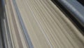 Stacks of books in shabby gray covers in the library. Rows of old books. Macro shot of old paper yellowed book pages