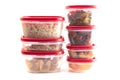 Boxes with Red Lids filled with Leftover Food Royalty Free Stock Photo