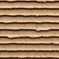 Stacks of brown cardboard sheets with a coarse, textured surfac Royalty Free Stock Photo