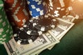 Stacks of chips on the money received as a result of winning the game of poker. Fortune or luck depends on the bet and the Royalty Free Stock Photo