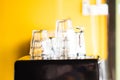 Stacks of coffee glasses on coffee machine Royalty Free Stock Photo