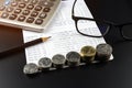 Stacks of Coin and and calculator on Banking Account for Business Finance Concept Royalty Free Stock Photo