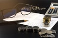 Stacks of Coin and and calculator on Banking Account for Business Finance Concept Royalty Free Stock Photo