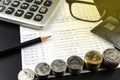 Stacks of Coin and and calculator on Banking Account for Business Finance Concept Royalty Free Stock Photo