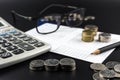 Stacks of Coin and and calculator on Banking Account for Business Finance Concept Royalty Free Stock Photo