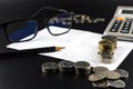 Stacks of Coin and and calculator on Banking Account for Business Finance Concept Royalty Free Stock Photo